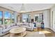 Spacious living room featuring a large sectional sofa and views of the outdoors at 4037 E Minton Cir, Mesa, AZ 85215