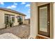 Charming home entrance with a private patio area at 4037 E Minton Cir, Mesa, AZ 85215