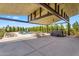 Beautiful pool and hot tub area with covered patio and outdoor seating at 4037 E Minton Cir, Mesa, AZ 85215