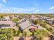 Aerial view of home featuring mature trees, outdoor living spaces, lush landscaping, and community at 4638 S San Benito Ct, Gilbert, AZ 85297