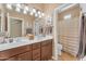 Well-maintained bathroom with double sinks, plenty of counter space and towel racks at 4638 S San Benito Ct, Gilbert, AZ 85297