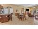 Open-concept dining area features a table, recessed lighting, and direct access to living room at 4638 S San Benito Ct, Gilbert, AZ 85297