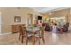 The dining area offers ample natural light and comfortable seating arrangements at 4638 S San Benito Ct, Gilbert, AZ 85297