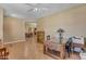 Spacious living room with tile flooring, ceiling fan and abundant natural light at 4638 S San Benito Ct, Gilbert, AZ 85297