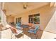 Relax on this shady patio, perfect for outdoor meals and enjoying the weather at 4638 S San Benito Ct, Gilbert, AZ 85297
