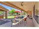 Spacious covered patio features ample seating and a great backyard view, ideal for relaxing outdoors at 4638 S San Benito Ct, Gilbert, AZ 85297