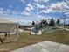 Community playground featuring slides, climbing structures, and sunshades at Gilbert Regional Park at 4638 S San Benito Ct, Gilbert, AZ 85297