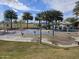 Community splash pad at Gilbert Regional Park with water features, palm trees, and playground elements at 4638 S San Benito Ct, Gilbert, AZ 85297