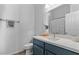 Modern bathroom featuring a large mirror, white countertop, and ample lighting at 470 N 168Th Ln, Goodyear, AZ 85338