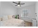 Bright bedroom with a ceiling fan and a window with plenty of natural light at 470 N 168Th Ln, Goodyear, AZ 85338