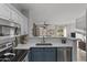Bright kitchen featuring stainless steel appliances, sleek countertops, and an open layout at 470 N 168Th Ln, Goodyear, AZ 85338