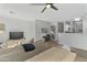 Bright and airy living room featuring modern furnishings and a neutral color palette at 470 N 168Th Ln, Goodyear, AZ 85338