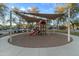 Colorful playground featuring a slide and climbing structure, providing a fun and safe play area for children at 470 N 168Th Ln, Goodyear, AZ 85338