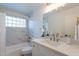 Bathroom featuring marble style tiling and quartz counters at 4846 E Grandview St, Mesa, AZ 85205