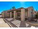 Exterior front view of the community clubhouse featuring large columns and a covered entrance at 520 N Stapley Dr # 286, Mesa, AZ 85203