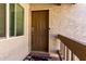Inviting front entry with decorative door mat and secure smart lock at 520 N Stapley Dr # 286, Mesa, AZ 85203