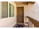 Inviting front entry with decorative door mat and secure smart lock at 520 N Stapley Dr # 286, Mesa, AZ 85203