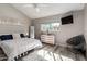 Serene main bedroom with light walls, wood-look floors, and comfy decor at 520 N Stapley Dr # 286, Mesa, AZ 85203