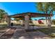 The community picnic area features a shaded pergola, providing a perfect spot for outdoor gatherings and barbecues at 520 N Stapley Dr # 286, Mesa, AZ 85203