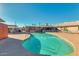Community pool with lounge chairs and desert landscaping at 5865 E Anaheim St, Mesa, AZ 85205