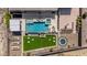 Overhead view of backyard featuring pool, spa, outdoor kitchen, patio and trampoline at 6328 W Fetlock Trl, Phoenix, AZ 85083