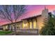 Exterior showcasing the stone accents, well-maintained landscaping, and stylish architectural details at 6328 W Fetlock Trl, Phoenix, AZ 85083