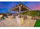 Beautiful pergola over grill and bar area with seating, great for entertaining at 6328 W Fetlock Trl, Phoenix, AZ 85083