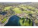 Picturesque aerial view of golf course and lake at 6545 E Ponderosa Loop, Gold Canyon, AZ 85118