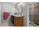 A comforting bathroom features a single sink and a shower at 711 E Laurel Dr # 17, Casa Grande, AZ 85122