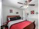 Bedroom with coordinating furniture, ceiling fan, and access to the en suite bathroom at 711 E Laurel Dr # 17, Casa Grande, AZ 85122