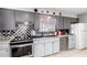 Charming kitchen with stainless steel appliances, decorative backsplash, and ample counter space at 711 E Laurel Dr # 17, Casa Grande, AZ 85122