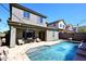 Backyard area showcasing the pool and string lights, great for relaxing evenings at 7712 S 37Th Way, Phoenix, AZ 85042