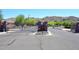 Gated entrance to the community with desert landscaping and mountain views at 7712 S 37Th Way, Phoenix, AZ 85042