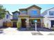 Beautiful two-story home featuring a stone-accented facade, desert landscaping, and a welcoming covered porch at 7712 S 37Th Way, Phoenix, AZ 85042