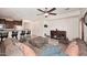 Open living area with bar seating and a comfortable sectional sofa at 7712 S 37Th Way, Phoenix, AZ 85042