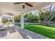 Expansive covered patio provides ample space for relaxation and entertaining, overlooking a well-manicured lawn at 8618 E Via De Encanto --, Scottsdale, AZ 85258