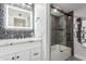 This bathroom features modern black and white decor, and a glass shower enclosure at 8618 E Via De Encanto --, Scottsdale, AZ 85258