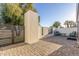 This private courtyard features an iron gate, lush plants, and comfortable seating at 8618 E Via De Encanto --, Scottsdale, AZ 85258