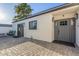 Charming single-story home featuring a private front patio with updated windows, entry door, and exterior lighting at 8618 E Via De Encanto --, Scottsdale, AZ 85258