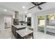 Open concept kitchen featuring marble countertops, stainless steel appliances, and modern fixtures at 8618 E Via De Encanto --, Scottsdale, AZ 85258