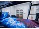 Bedroom with a bunk bed and shelving at 8725 E Vista Dr, Scottsdale, AZ 85250