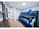 Bedroom featuring a bunk bed and a neutral carpet at 8725 E Vista Dr, Scottsdale, AZ 85250