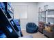 Bright bedroom featuring bunk beds, a cozy beanbag chair, and decorative shelving at 8725 E Vista Dr, Scottsdale, AZ 85250