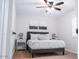 Bright bedroom featuring a double bed, neutral colors, ceiling fan, and natural light at 8725 E Vista Dr, Scottsdale, AZ 85250