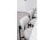 Counter seating with padded white chairs and dark metal legs at 8725 E Vista Dr, Scottsdale, AZ 85250