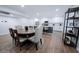 Well-lit open layout with a kitchen featuring stainless steel appliances and dining area with seating at 8725 E Vista Dr, Scottsdale, AZ 85250