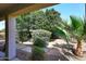 View of the landscaped backyard at 9512 E Kilarea Ave, Mesa, AZ 85209