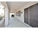 Covered patio with multiple sliding doors at 9512 E Kilarea Ave, Mesa, AZ 85209