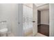 Clean bathroom featuring modern fixtures, a shower curtain, and an access door to the bedroom at 955 E Knox Rd # 224, Chandler, AZ 85225