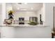 An open kitchen design with stainless steel appliances and decorative counter elements at 955 E Knox Rd # 224, Chandler, AZ 85225